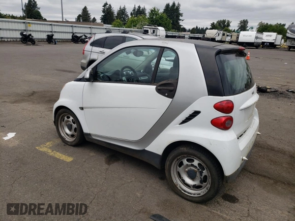 2012 Smart fortwo Pure с VIN WMEEJ3BA1CK573090, выставлен на аукционе Copart как лот 59881025 с пробегом 128 086 миль миль и Чистый • Clean title. История ставок и продаж доступна на DreamBid. Изображение 2.