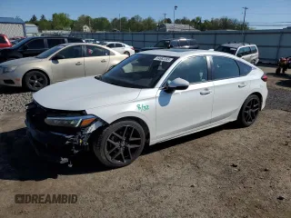 2023 Honda Civic Sport Touring z VIN 19XFL1H84PE005074, wystawiony jako Copart lot #54683385 z przebiegiem 31 520 mil mil oraz Szkoda całkowita • Salvage title. Historia ofert i sprzedaży dostępna na DreamBid. Obrazek 1.