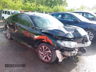 2017 Honda Civic EX z VIN 19XFC2F74HE057015, wystawiony jako IAAI lot #42145513 z przebiegiem 130 694 mil mil oraz . Historia ofert i sprzedaży dostępna na DreamBid. Obrazek 1.
