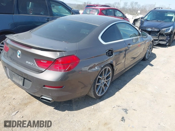 2012 BMW 6 Series 650i z VIN WBALX3C57CC528832, wystawiony jako IAAI lot #41779268 z przebiegiem 75 119 mil mil oraz . Historia ofert i sprzedaży dostępna na DreamBid. Obrazek 4.