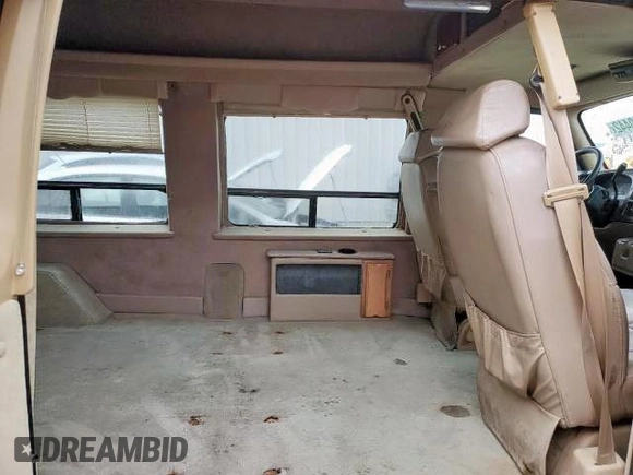 2000 Dodge Cargo Conversion with VIN 2B6HB11Y0YK148526, listed as a Copart auction lot 87270124 with 242,057 mi miles and Clean Title. Bid and sale history available at carsss.com. Image 6.