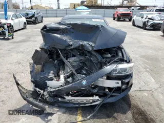 2014 BMW 4 Series 428i xDrive z VIN WBA3N9C56EF722472, wystawiony jako Copart lot #59873185 z przebiegiem 129 926 mil mil oraz Szkoda całkowita • Salvage title. Historia ofert i sprzedaży dostępna na DreamBid. Obrazek 5.
