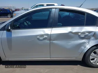 2014 Chevrolet Cruze LS z VIN 1G1PA5SH6E7468916, wystawiony jako IAAI lot #42282737 z przebiegiem 120 129 mil mil oraz . Historia ofert i sprzedaży dostępna na DreamBid. Obrazek 14.