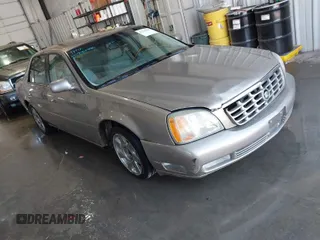 2001 Cadillac DeVille DTS with VIN 1G6KF57911U263913, listed as a IAAI auction lot 41744490 with 100,235 mi miles. Bid and sale history available at carsss.com. Image 1.