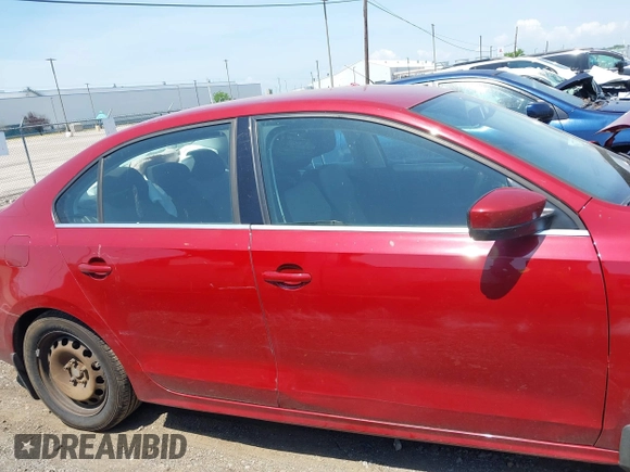 2017 Volkswagen Jetta S z VIN 3VW2B7AJ6HM232479, wystawiony jako IAAI lot #42579313 z przebiegiem 100 582 mil mil oraz . Historia ofert i sprzedaży dostępna na DreamBid. Obrazek 13.