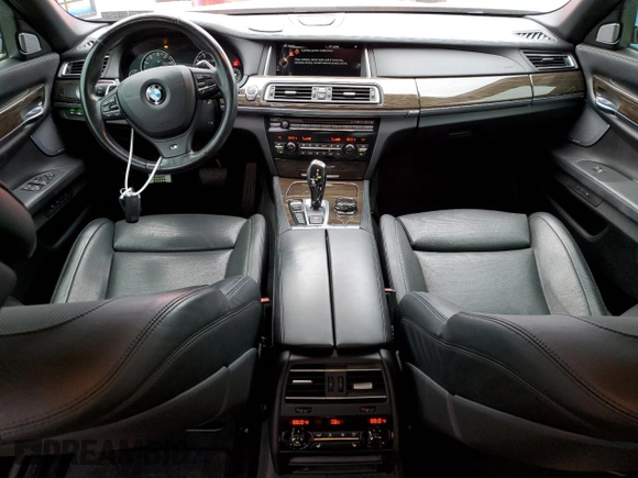 2015 BMW 7 Series 750Li xDrive z VIN WBAYF8C54FD654795, wystawiony jako Copart lot #82381894 z przebiegiem 56 968 mil mil oraz Szkoda całkowita • Salvage title. Historia ofert i sprzedaży dostępna na DreamBid. Obrazek 8.