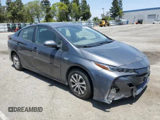 2021 Toyota Prius LE z VIN JTDKAMFPXM3174518, wystawiony jako Copart lot #58854495 z przebiegiem 83 445 mil mil oraz Szkoda całkowita • Salvage title. Historia ofert i sprzedaży dostępna na DreamBid. Obrazek 4.