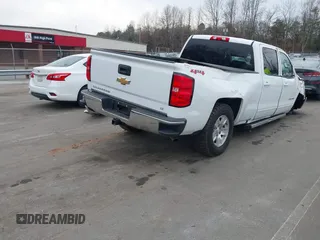 2018 Chevrolet Silverado 1500 LT with VIN 1GCUKREC0JF208509, listed as a IAAI auction lot 41794616 with 96,962 mi miles and . Bid and sale history available at DreamBid. Image 4.