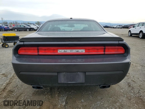 2013 Dodge Challenger R/T z VIN 2C3CDYBT0DH741262, wystawiony jako Copart lot #49185255 z przebiegiem 97 902 mil mil oraz Szkoda całkowita • Salvage title. Historia ofert i sprzedaży dostępna na DreamBid. Obrazek 6.