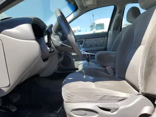 2005 Ford Taurus SE with VIN 1FAFP53U25A303516, listed as a Copart auction lot 63250505 with 203,463 mi miles and Salvage title. Bid and sale history available at DreamBid. Image 7.