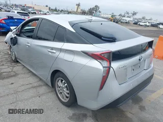 2018 Toyota Prius Two with VIN JTDKARFU0J3056217, listed as a IAAI auction lot 42185122 with 52,344 mi miles and . Bid and sale history available at DreamBid. Image 3.