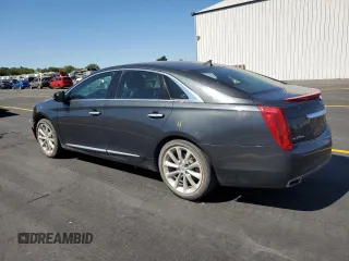 2013 Cadillac XTS Luxury with VIN 2G61R5S32D9216672, listed as a Copart auction lot 58392955 with 94,272 mi miles and Salvage title. Bid and sale history available at DreamBid. Image 2.