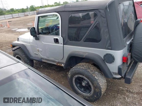 2004 Jeep Wrangler Sport with VIN 1J4FA49S44P772575, listed as a IAAI auction lot 42512876 with 226,387 mi miles and . Bid and sale history available at DreamBid. Image 15.