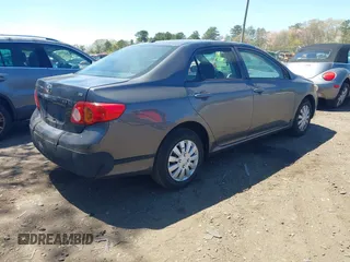 2010 Toyota Corolla with VIN 2T1BU4EE5AC527290, listed as a IAAI auction lot 42101864 with 77,908 mi miles. Bid and sale history available at carsss.com. Image 4.