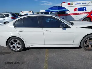 2014 BMW 3 Series 328i with VIN WBA3A5C55EP647035, listed as a IAAI auction lot 41480711 with 105,792 mi miles. Bid and sale history available at carsss.com. Image 13.