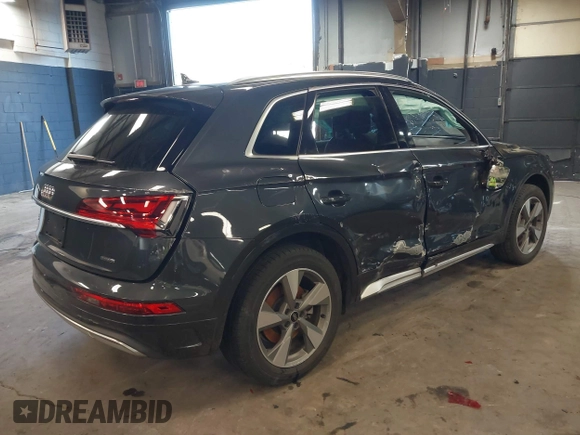 2023 Audi Q5 Premium with VIN WA1ABAFY7P2053949, listed as a IAAI auction lot 41657681 with 18,414 mi miles and . Bid and sale history available at DreamBid. Image 4.