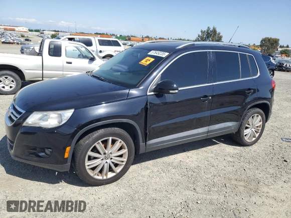 2011 Volkswagen Tiguan SEL w/Premium Navi with VIN WVGAV7AX2BW550158, listed as a Copart auction lot 57649235 with 133,346 mi miles and Clean title. Bid and sale history available at DreamBid. Image 1.