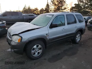2003 Mazda Tribute ES with VIN 4F2CZ96133KM16575, listed as a Copart auction lot 87240694 with 125,656 mi miles and Salvage Title. Bid and sale history available at carsss.com. Image 1.