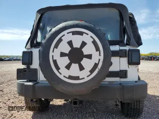 2012 Jeep Wrangler Sport с VIN 1C4AJWAG0CL219303, выставлен на аукционе Copart как лот 55102115 с пробегом 104 003 миль миль и Списание • Salvage title. История ставок и продаж доступна на DreamBid. Изображение 6.