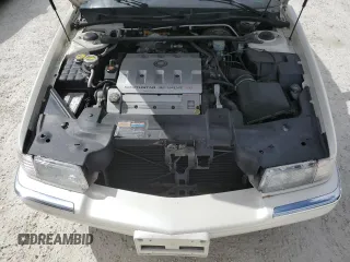 2002 Cadillac Eldorado z VIN 1G6EL12Y32B102263, wystawiony jako Copart lot #77108634 z przebiegiem 43 162 mil mil oraz Nie do naprawy • Non repairable. Historia ofert i sprzedaży dostępna na DreamBid. Obrazek 11.