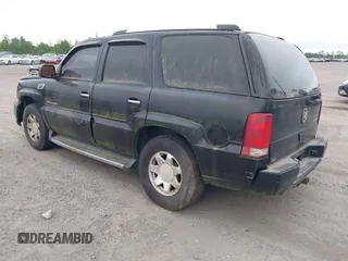 2003 Cadillac Escalade z VIN 1GYEK63N73R203813, wystawiony jako IAAI lot #42138841 z przebiegiem 68 483 mil mil oraz . Historia ofert i sprzedaży dostępna na DreamBid. Obrazek 3.