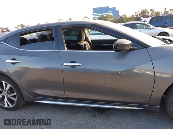 2017 Nissan Maxima SV with VIN 1N4AA6AP7HC387081, listed as a IAAI auction lot 41710501 with 144,538 mi miles. Bid and sale history available at carsss.com. Image 13.