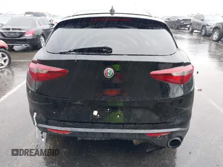 2018 Alfa Romeo Stelvio z VIN ZASFAKANXJ7C23921, wystawiony jako IAAI lot #38783836 z przebiegiem 93 482 mil mil oraz . Historia ofert i sprzedaży dostępna na DreamBid. Obrazek 16.