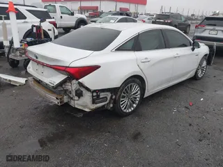 2020 Toyota Avalon Hybrid Limited with VIN 4T1C21FB9LU016373, listed as a IAAI auction lot 41536148 with 104,675 mi miles. Bid and sale history available at carsss.com. Image 4.