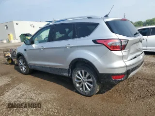 2018 Ford Escape Titanium с VIN 1FMCU9J9XJUD44928, выставлен на аукционе Copart как лот 59675445 с пробегом 37 485 миль миль и Чистый • Clean title. История ставок и продаж доступна на DreamBid. Изображение 2.