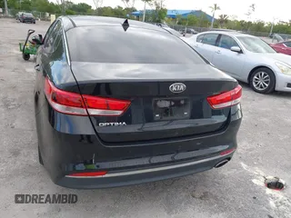 2018 Kia Optima LX z VIN 5XXGT4L33JG270472, wystawiony jako IAAI lot #42292416 z przebiegiem 60 064 mil mil oraz . Historia ofert i sprzedaży dostępna na DreamBid. Obrazek 17.