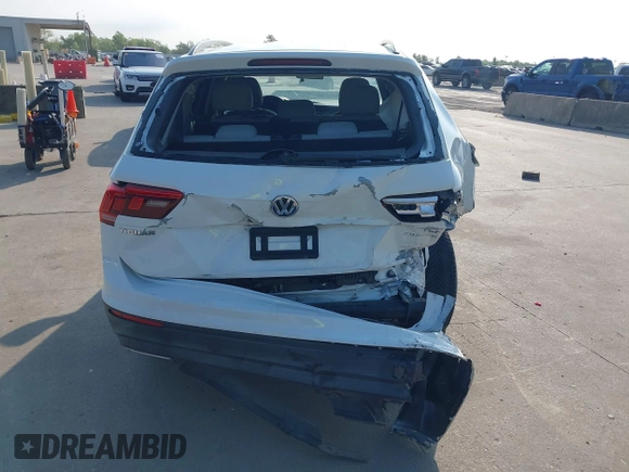 2018 Volkswagen Tiguan S with VIN 3VV1B7AX1JM119971, listed as a IAAI auction lot 42039977 with 108,932 mi miles and . Bid and sale history available at DreamBid. Image 16.