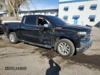 2019 Chevrolet Silverado 1500 LTZ with VIN 3GCUYGEL2KG182725, listed as a Copart auction lot 50393705 with 135,057 mi miles and Salvage Title. Bid and sale history available at DreamBid. Image 4.