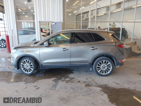 2016 Lincoln MKC Reserve with VIN 5LMCJ3C93GUJ19078, listed as a IAAI auction lot 41633487 with 91,961 mi miles and . Bid and sale history available at DreamBid. Image 14.