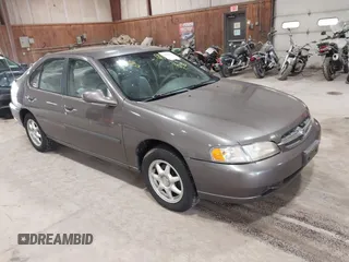 1998 Nissan Altima XE with VIN 1N4DL01D9WC181624, listed as a IAAI auction lot 42222694 with 155,391 mi miles and . Bid and sale history available at carsss.com. Image 1.