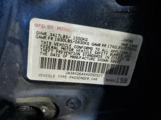 1999 Mitsubishi Mirage DE with VIN JA3AY26AXXU050527, listed as a Copart auction lot 74435914 with 101,224 mi miles and Salvage title. Bid and sale history available at DreamBid. Image 13.
