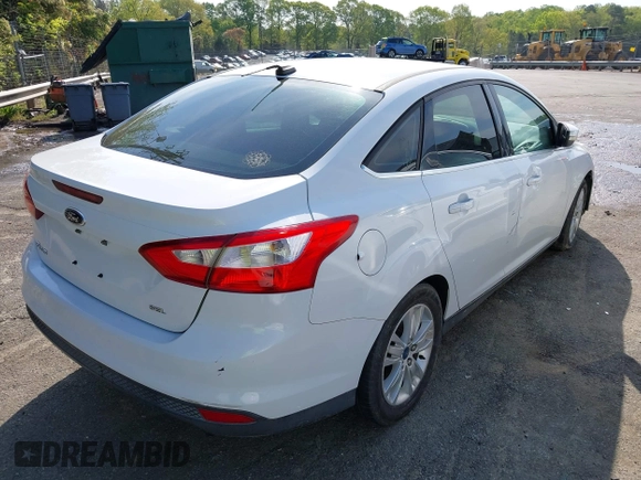 2012 Ford Focus SEL with VIN 1FAHP3H20CL470527, listed as a IAAI auction lot 42028826 with 165,197 mi miles. Bid and sale history available at carsss.com. Image 4.