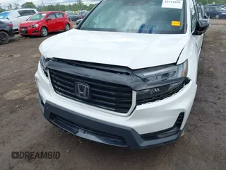 2021 Honda Ridgeline Sport with VIN 5FPYK3F14MB005117, listed as a IAAI auction lot 42343059 with 58,862 mi miles and . Bid and sale history available at DreamBid. Image 6.