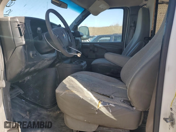 2012 Chevrolet Express Cargo with VIN 1GCSGAFX0C1101889, listed as a Copart auction lot 43868765 with 220,614 mi miles and Salvage title. Bid and sale history available at DreamBid. Image 7.