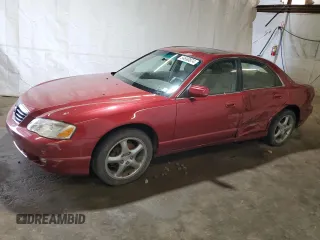 2001 Mazda Millenia S with VIN JM1TA222111707236, listed as a Copart auction lot 54690874 with 107,530 mi miles and Salvage Title. Bid and sale history available at DreamBid. Image 1.