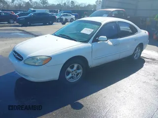 2002 Ford Taurus SE Standard with VIN 1FAFP53U82A177707, listed as a IAAI auction lot 41617187 with 239,748 mi miles and . Bid and sale history available at DreamBid. Image 2.
