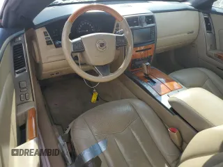2008 Cadillac XLR z VIN 1G6YV36A785600957, wystawiony jako Copart lot #72325014 z przebiegiem Nie podano mil oraz Szkody całkowita. Historia ofert i sprzedaży dostępna na DreamBid. Obrazek 8.