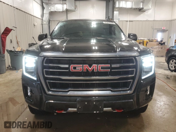 2023 GMC Yukon AT4 with VIN 1GKS2CKDXPR164502, listed as a Copart auction lot 41672705 with 34,856 mi miles and Salvage Title. Bid and sale history available at carsss.com. Image 5.