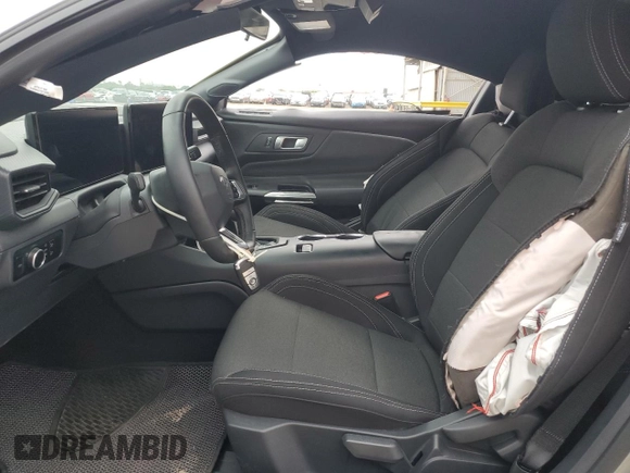 2024 Ford Mustang EcoBoost with VIN 1FA6P8TH9R5138602, listed as a Copart auction lot 56148965 with 4,919 mi miles and Salvage title. Bid and sale history available at DreamBid. Image 7.