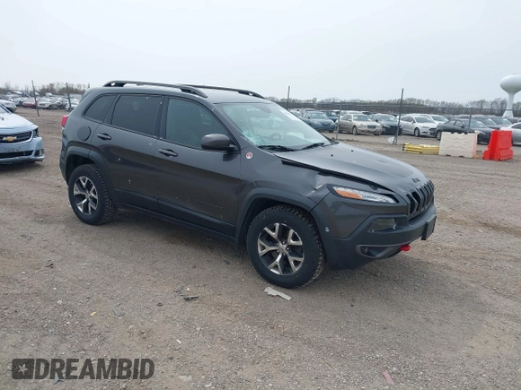 2016 Jeep Cherokee Trailhawk z VIN 1C4PJMBS4GW167650, wystawiony jako IAAI lot #41936549 z przebiegiem 218 000 mil mil oraz . Historia ofert i sprzedaży dostępna na DreamBid. Obrazek 1.