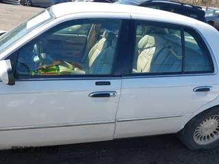 2002 Mercury Grand Marquis LS Premium z VIN 2MEFM75W92X641347, wystawiony jako IAAI lot #41701179 z przebiegiem 79 942 mil mil oraz . Historia ofert i sprzedaży dostępna na DreamBid. Obrazek 14.