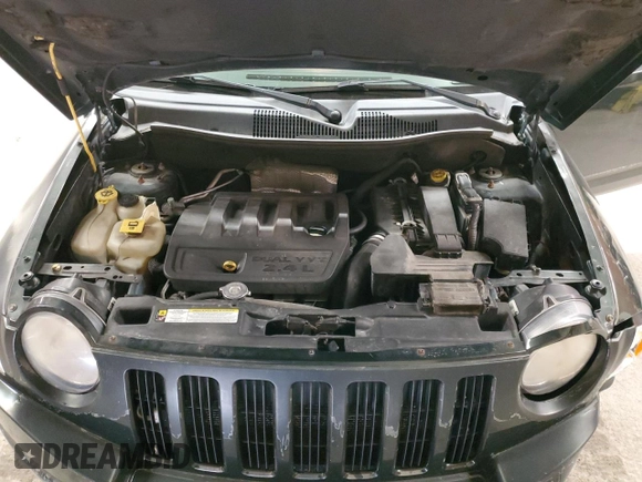 2010 Jeep Compass Sport with VIN 1J4NF4FB5AD589426, listed as a Copart auction lot 47644715 with 172,311 mi miles and Salvage Title. Bid and sale history available at carsss.com. Image 12.
