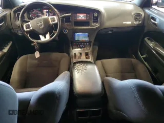 2012 Dodge Charger Police z VIN 2C3CDXAT8CH230344, wystawiony jako Copart lot #55970325 z przebiegiem 191 574 mil mil oraz Szkoda całkowita • Salvage title. Historia ofert i sprzedaży dostępna na DreamBid. Obrazek 8.