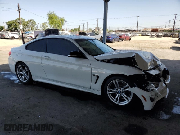 2014 BMW 4 Series 428i with VIN WBA3N3C57EF711803, listed as a Copart auction lot 57856695 with 68,905 mi miles and Salvage title. Bid and sale history available at DreamBid. Image 4.