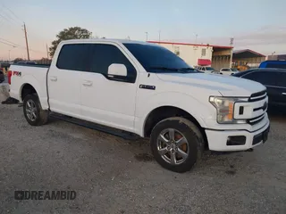 2018 Ford F-150 XL with VIN 1FTEW1EG4JKD64590, listed as a IAAI auction lot 41056678 with 115,792 mi miles. Bid and sale history available at carsss.com. Image 1.