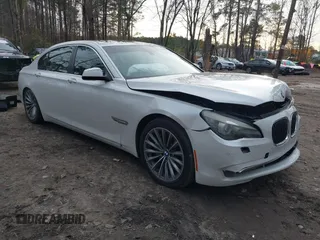 2011 BMW 7 Series 740Li with VIN WBAKB4C55BC574481, listed as a IAAI auction lot 41070506 with 105,021 mi miles. Bid and sale history available at carsss.com. Image 1.